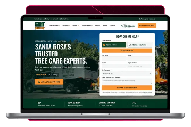 The SRT Forestry client website displayed on a laptop